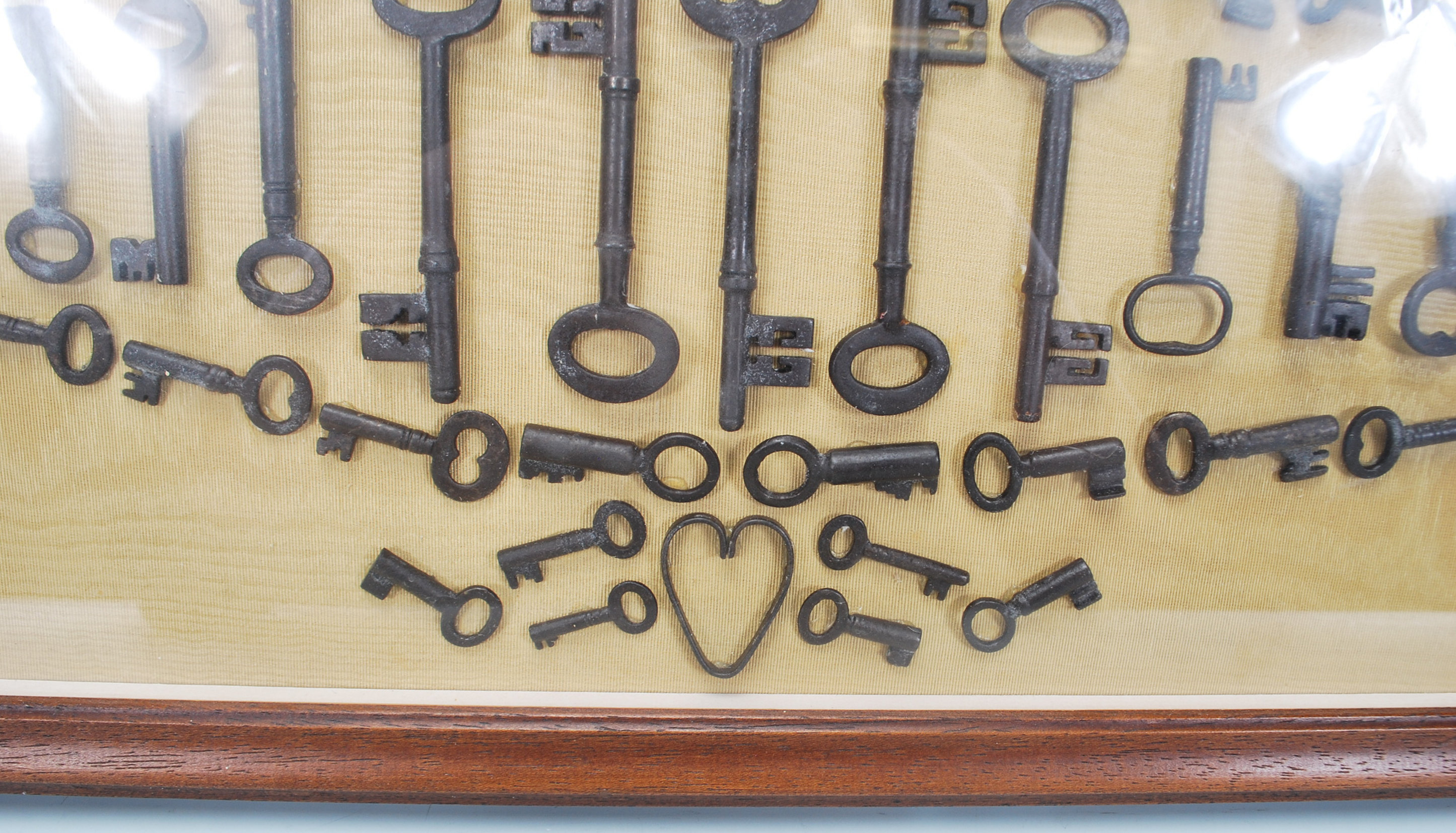 A selection of 19th Century antique keys and locks arranged into a geometric pattern and framed, set - Image 5 of 7