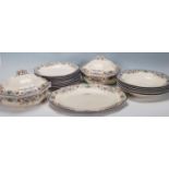 A Royal Doulton Draycott pattern Art Deco dinner service comprising dinner plates, side plates, meat