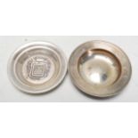 A 20th Century silver English hallmarked pin / trinket dish of round form. Hallmarked for London