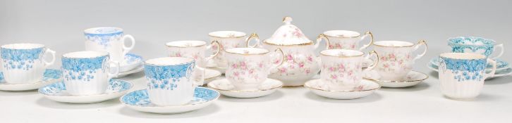 A mixed group of coffee cans / cups and saucers dating from the early 20th Century to include A