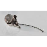 A stamped 925 silver brooch of small proportions in the form of a mouse being set with a faceted