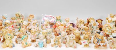 A large collection of Cherished Teddies of varying models and sizes to include 'Grace', 'Beverly And