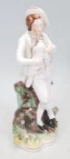 A 19th Century Staffordshire figurine in the form of a man holding a puppy leaning on a tree stump