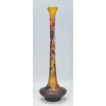 A Galle Tip Art Nouveau style vase having a bulbous form base with a tapering neck, a yellow