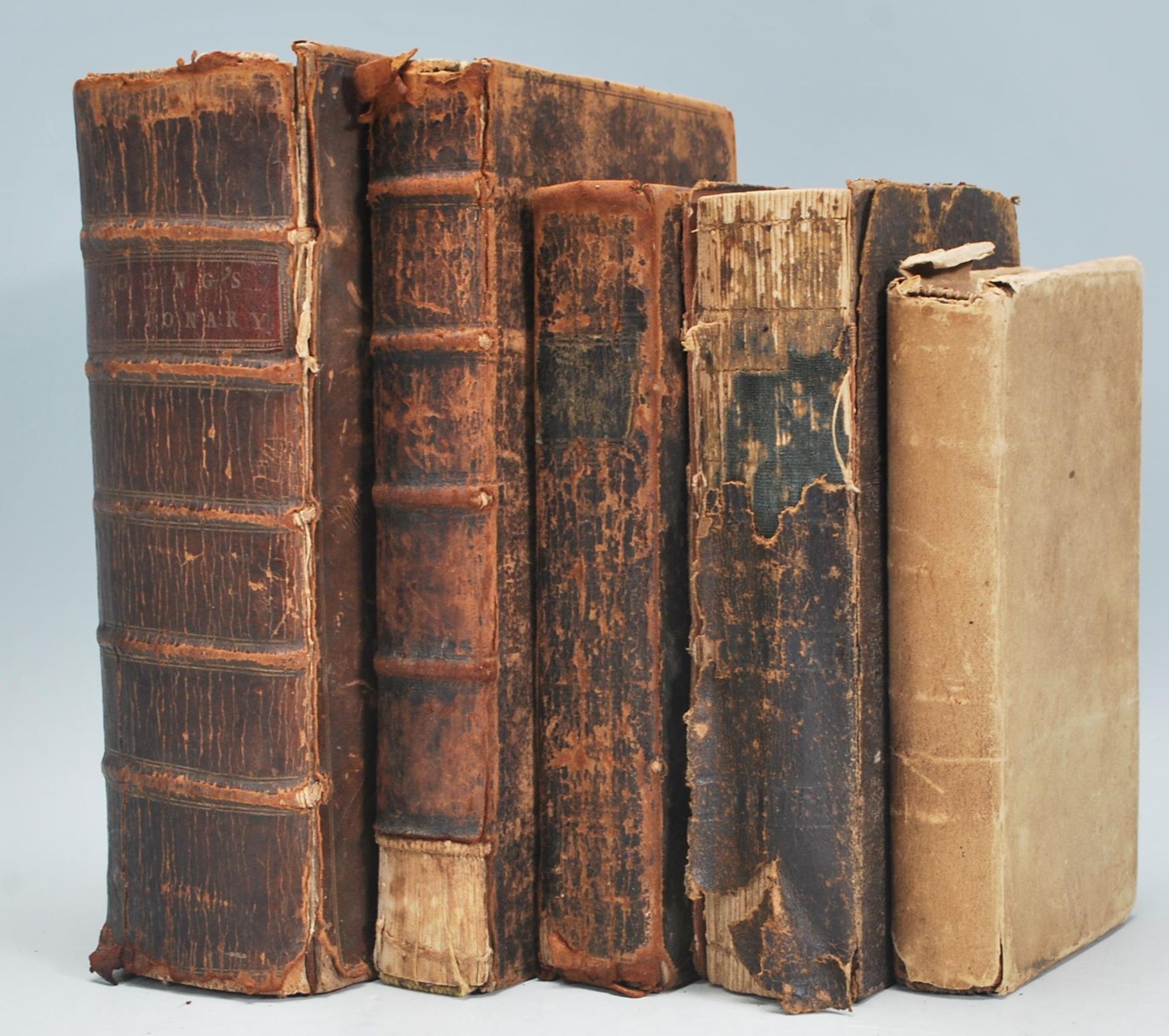 A collection of antique 18th Century and 19th Century books to include a Holy Bible dated 1831, W.