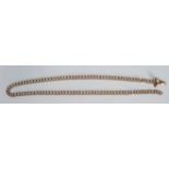 A 9ct gold double curb link chain necklace having a lobster clasp. Marked 375 to the clasp. Weight