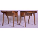 A pair of vintage / retro mid 20th Century school desks, plank top with lift up flap to rear with