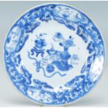 A Chinese 18th Century plate hand painted in blue and white with the precious objects / 100 one