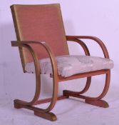 A good early 20th Century Art Deco Lloyd Loom armchair having D design arm rests terminating in