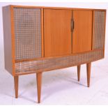 A vintage 1960's / 70's stereogram being beech wood cased, having a central Decca radio with