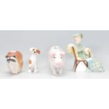 A collection of ceramic figurines to include a Royal Doulton 'Ascot' figurine HN2356, a Royal