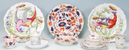 A mixed collection of ceramic wares dating from the 19th Century to include a T. Goode gilt trio