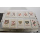 An album of vintage Wills's Cigarette trade cards in full sets. The wills sets include Arms Of The