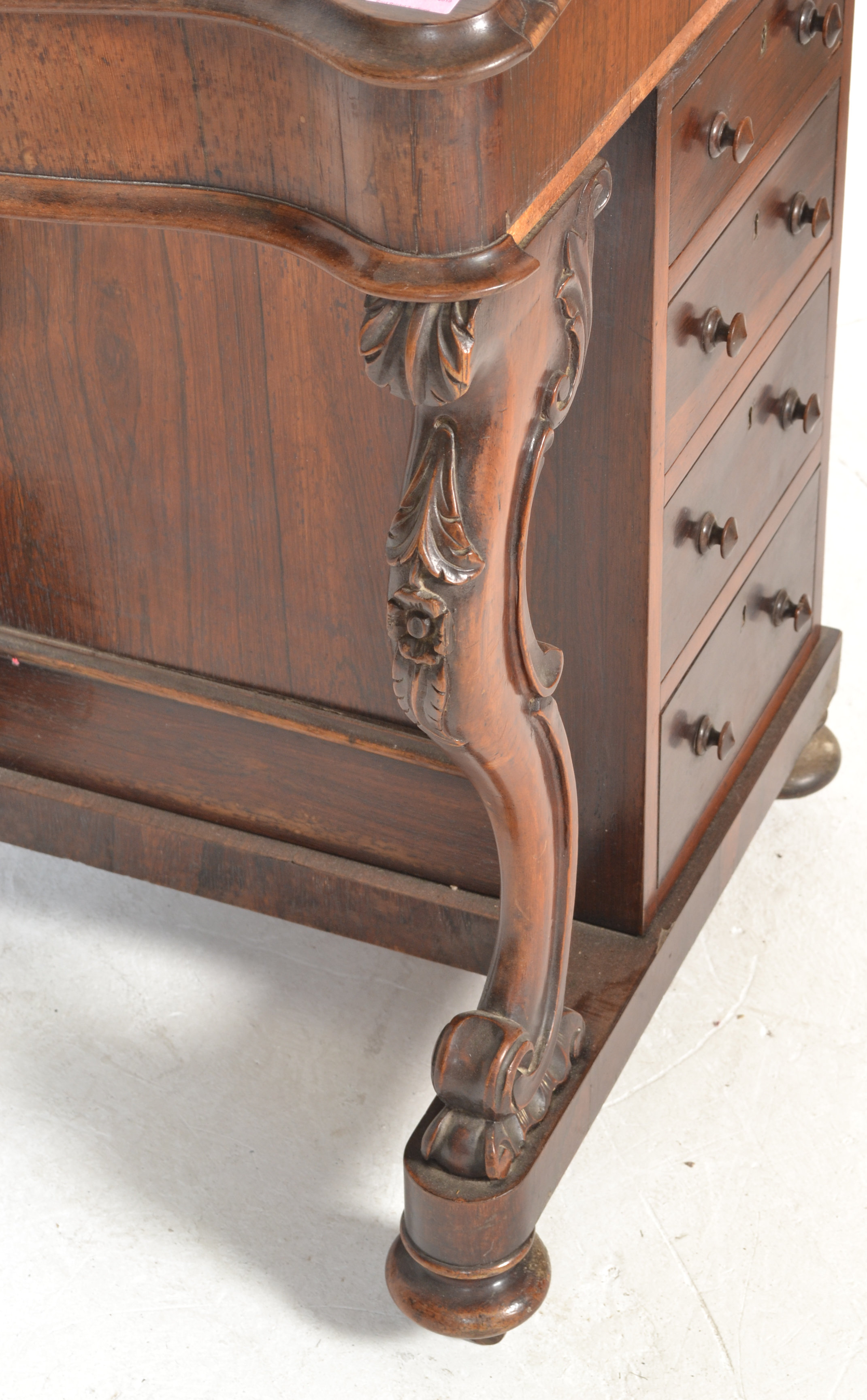 A Victorian 19th century rosewood davenport desk being raised on scroll supports with carved - Image 6 of 6