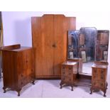 An early 20th Century 1930's Art Deco walnut bedroom suite, consisting of a single twin door