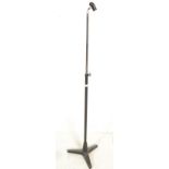 A vintage 20th Century adjustable mic stand in the