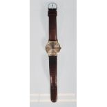 A vintage 1970's 9ct gold gentleman's Tissot Seastar Seven wrist watch having a silver dial with