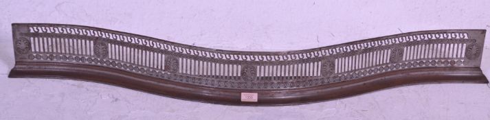 A 19th Century Georgian fire guard of serpentine form having pierced panelled decoration with