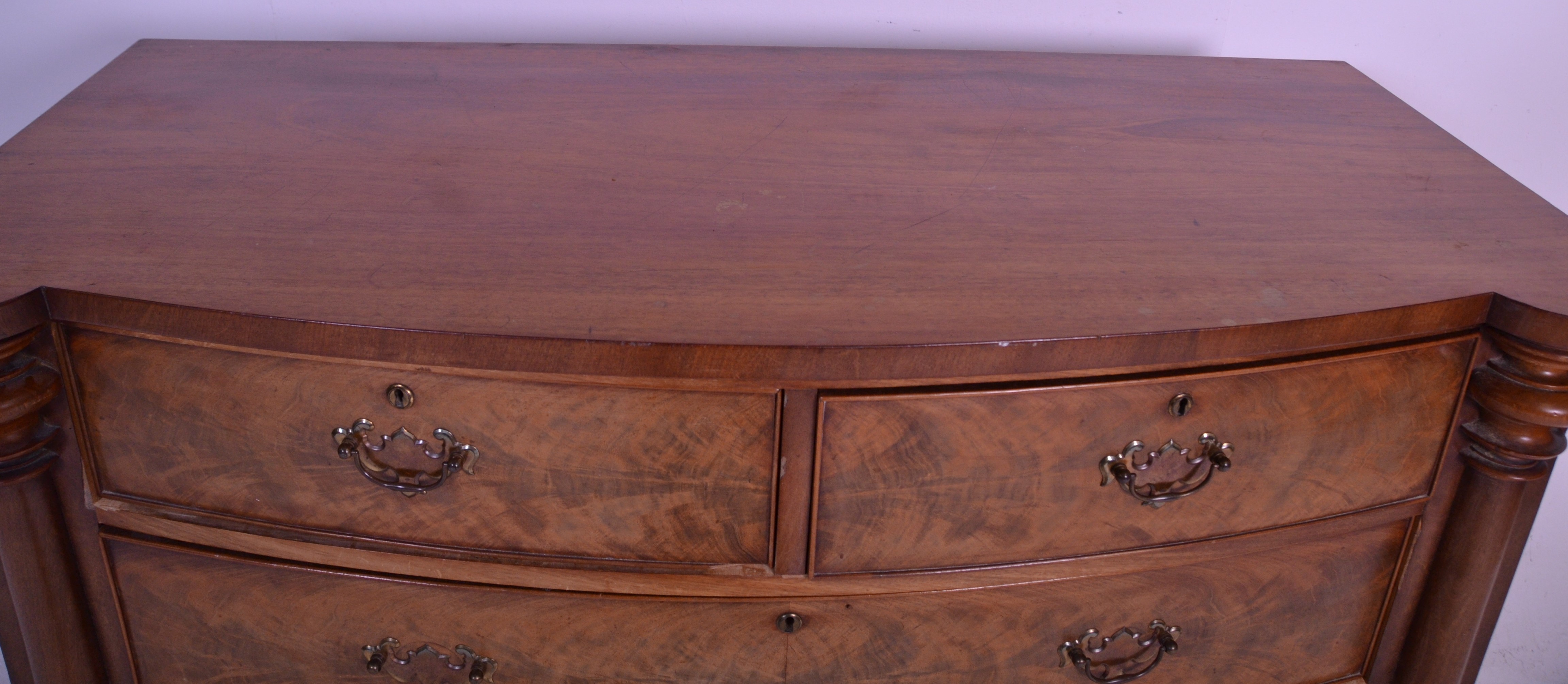 A 19th Century Victorian mahogany bow front of drawers. Two short over three long drawers having - Image 2 of 3