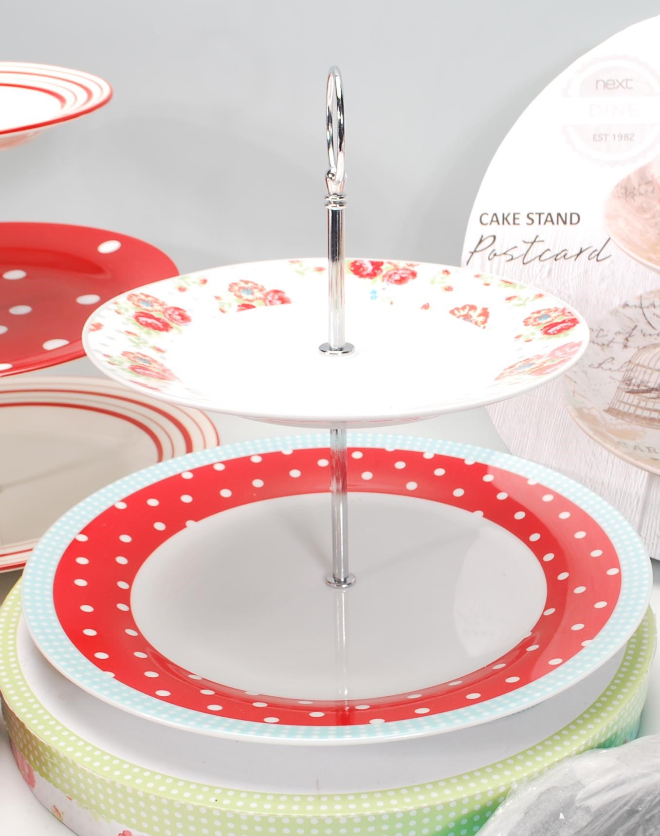 A group of six contemporary china cake stands to include a Rosies Pantry two tier cake stand, two - Image 4 of 7