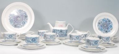 A vintage retro Pontesa Castillian Collection coffee service having a white ground with a floral