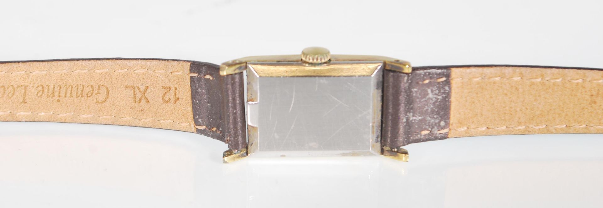 A vintage 1970's ladies Omega wrist watch having a rectangular face with a champagne dial with - Bild 6 aus 9