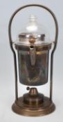 A vintage early 20th Century coffee spirit kettle of cylindrical brass construction having a glass