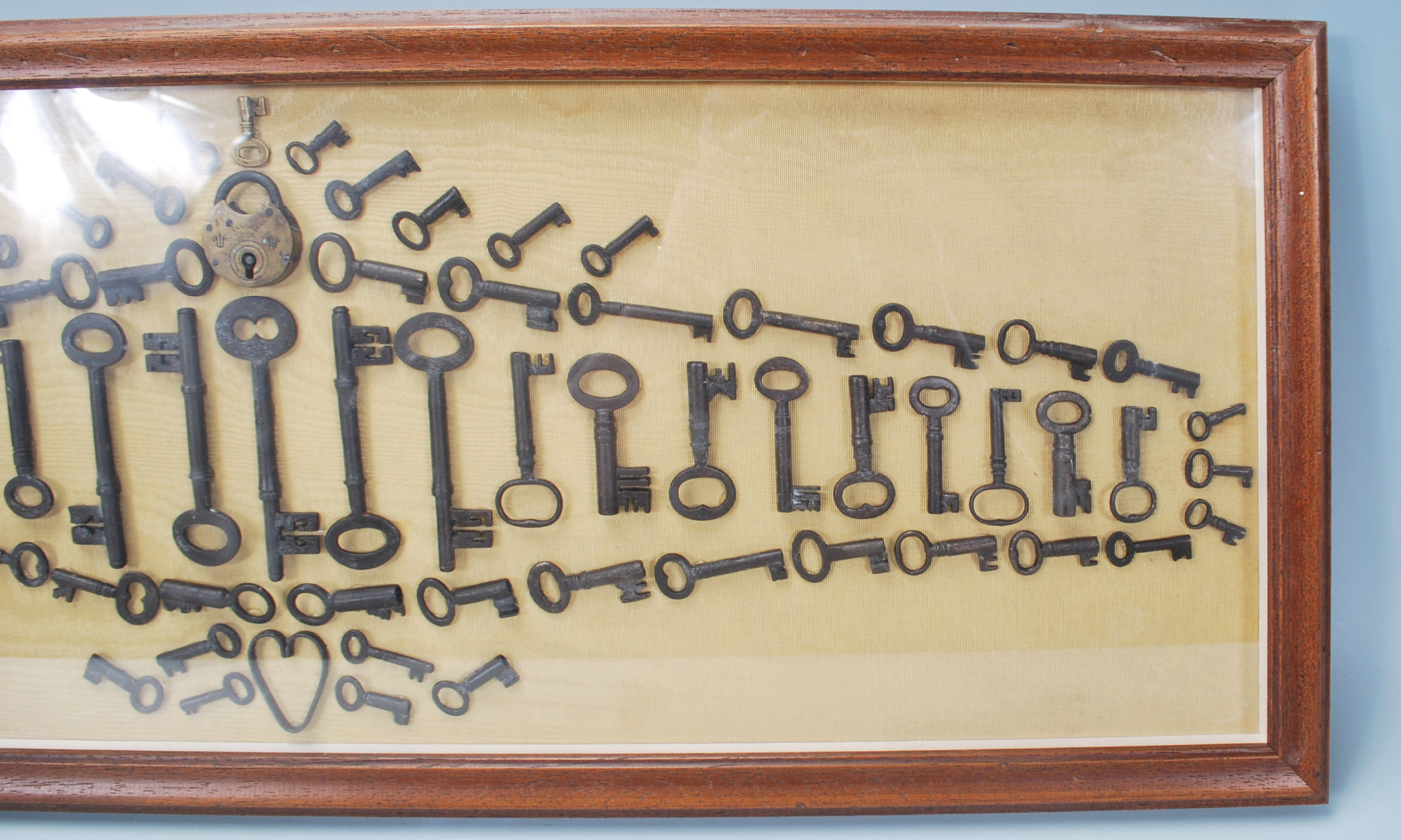 A selection of 19th Century antique keys and locks arranged into a geometric pattern and framed, set - Image 4 of 7