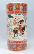 A 20th Century Japanese ceramic stick stand vase of cylindrical form having a central panel hand