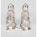 A pair of silver plated novelty salt and pepper condiment shakers in the form of two hopeful rats.