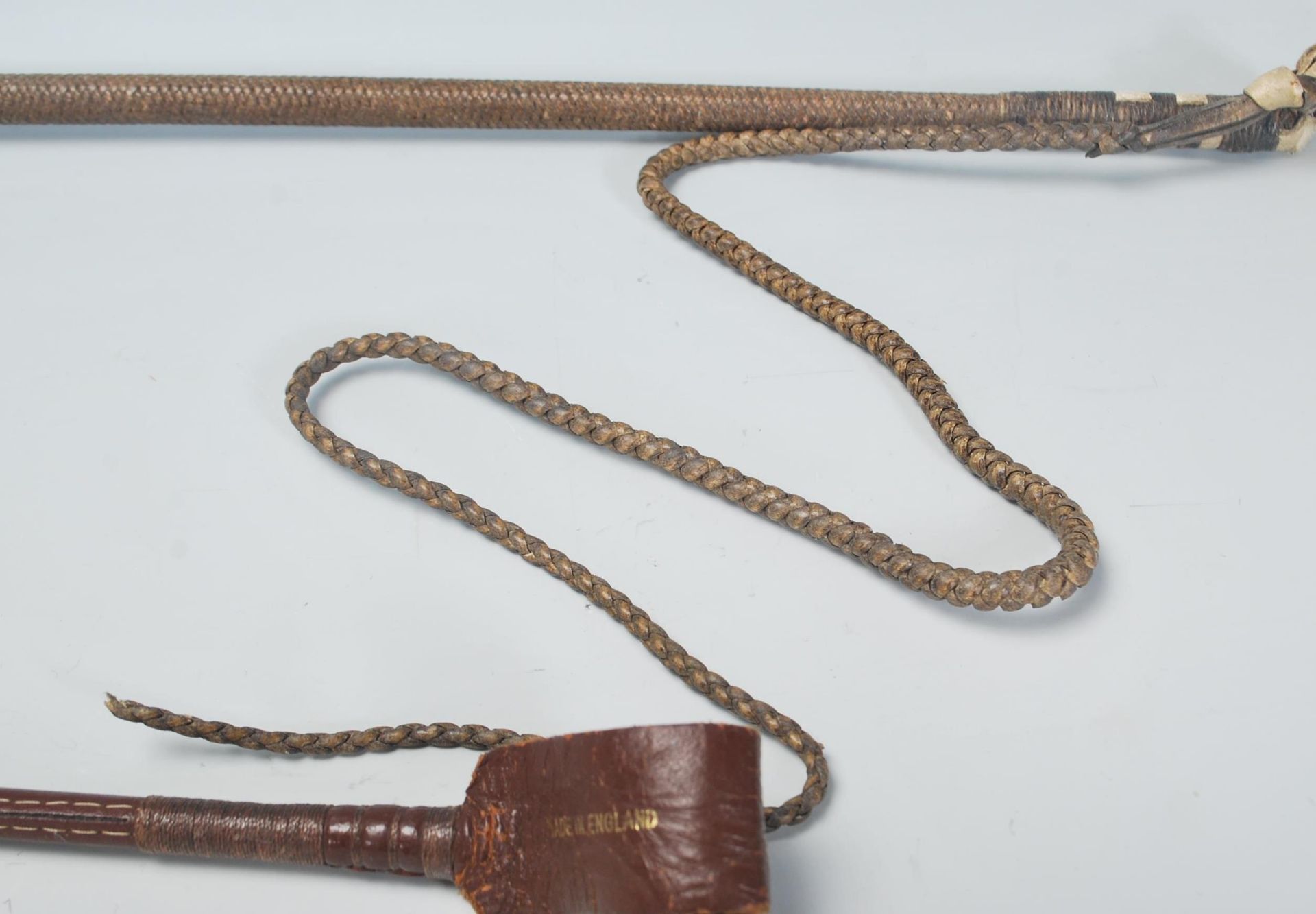 A pair of 20th century horse correction whip, with - Bild 2 aus 7