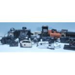 A large collection of 20th century vintage 35mm photography cameras to include: Halina 35X Super,