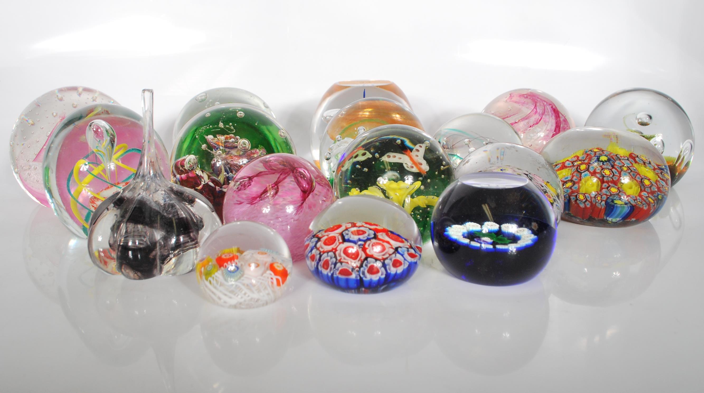 A large collection of 20th century paper weights, to include multi colour floral examples, control