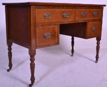 An Edwardian mahogany and leather inlaid writing table desk. Raised on square tapering legs with