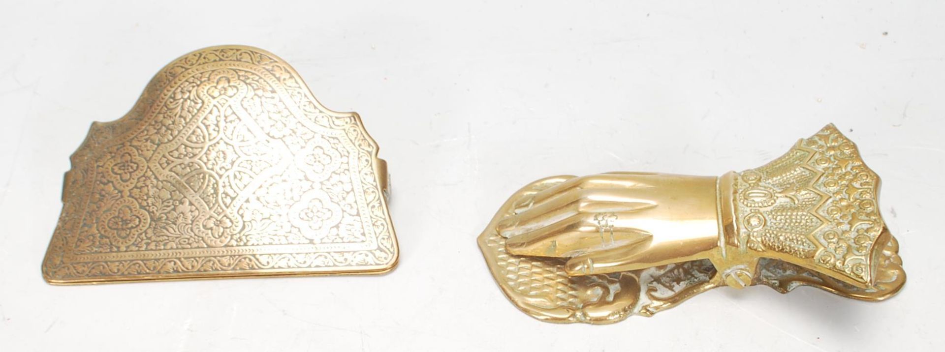 A pair of antique brass wall mounting paper clips to include one in the form of a hand with a - Image 2 of 4
