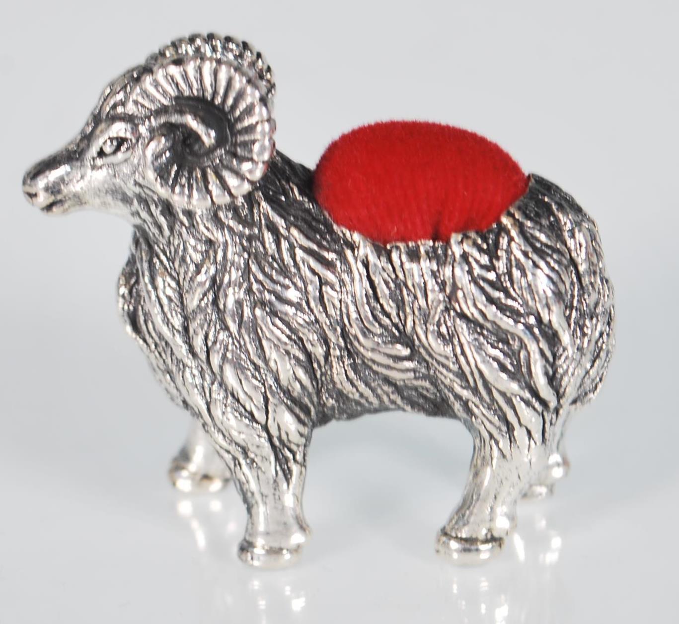 A small sterling silver pin cushion in the form of a ram. Measures: 3.4 x 4.3 x 1.2. Weight: 14.6g. - Image 5 of 7