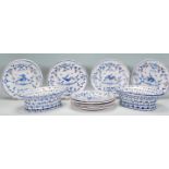 A group of French Faience plates each having a whi
