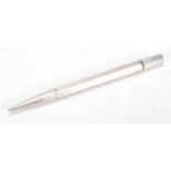 A silver hallmarked propelling pencil by Johnson Matthey & Co, London assay, dating to 1946, gross