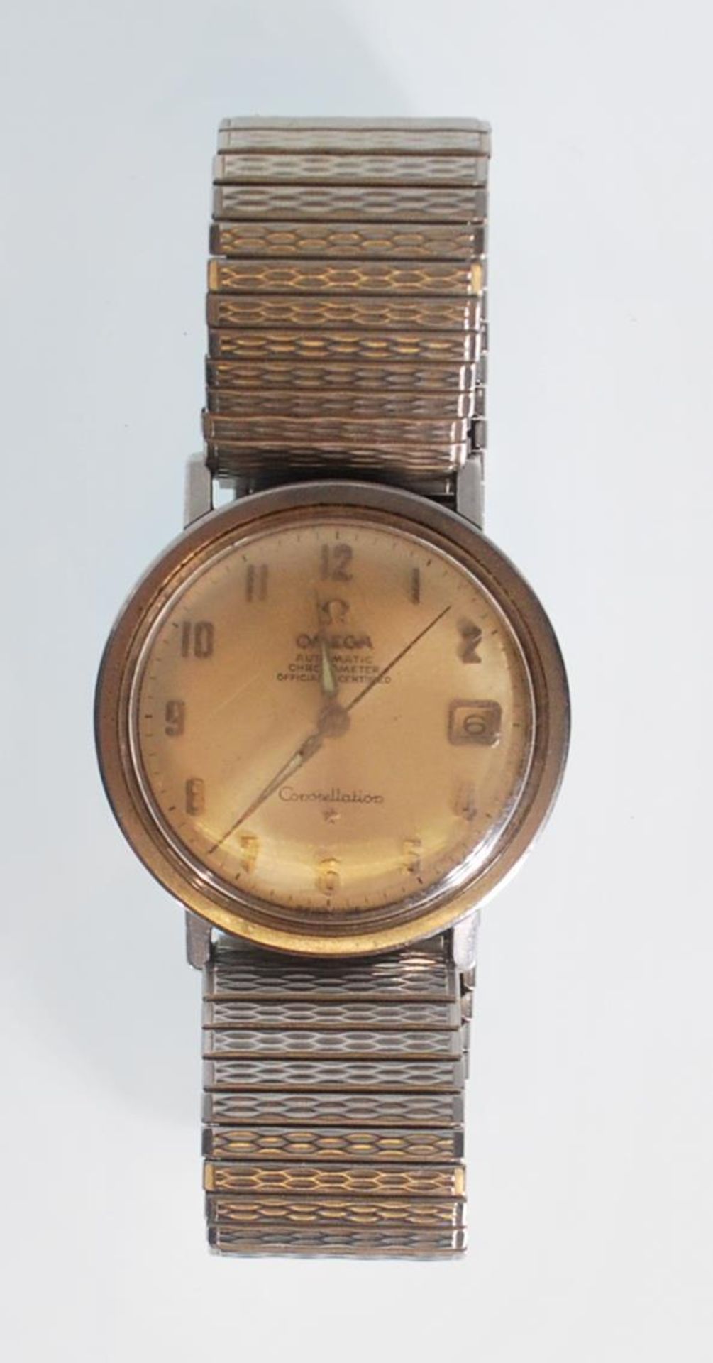 A vintage Omega Constellation Automatic Chronometer wristwatch having a champagne dial with Arabic