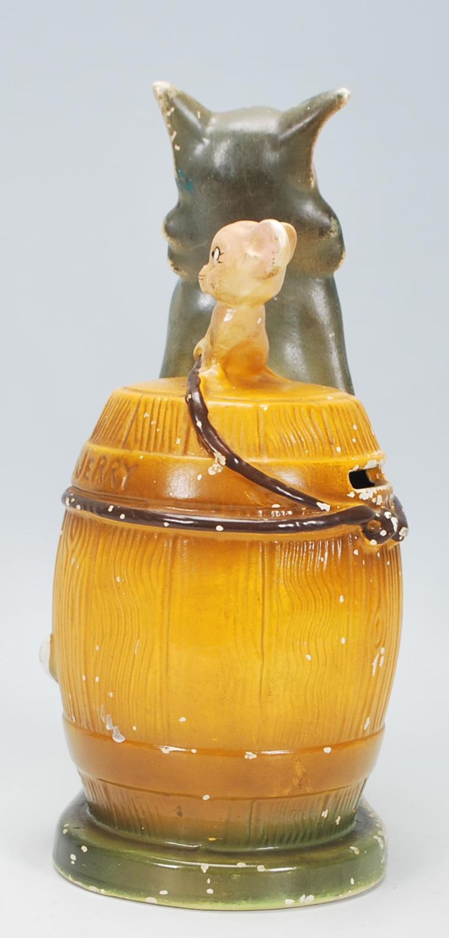 A vintage retro 20th Century 1972 Tom and Jerry money box depicting Tom strapped to a barrel with - Bild 4 aus 7