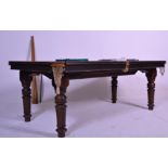 A 1920's Riley oak snooker table / dining table combination. Raised on reeded turned and tapering