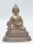 An Indian bronze figurine / ornament in the form of Buddha, modelled in a seated position raised