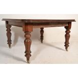 A good 19th century Victorian mahogany extending dining table having a square large top with