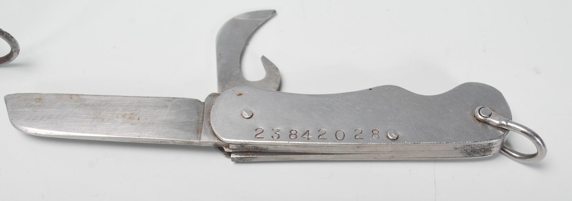 A military issue Warriss of Sheffield pocket knife marked 1953 with broad arrow and Oil the - Image 9 of 9