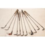 A set of vintage golf clubs most by Dai Rees, a John Jacobs driver, a Spalding top flite driver,