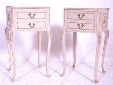 A pair of 20th century Louis XV1 painted bedside cabinets  being raised on cabriole legs with pad