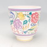 A vintage retro 20th Century Poole pottery LE pattern jardiniere having a cylindrical body raised on