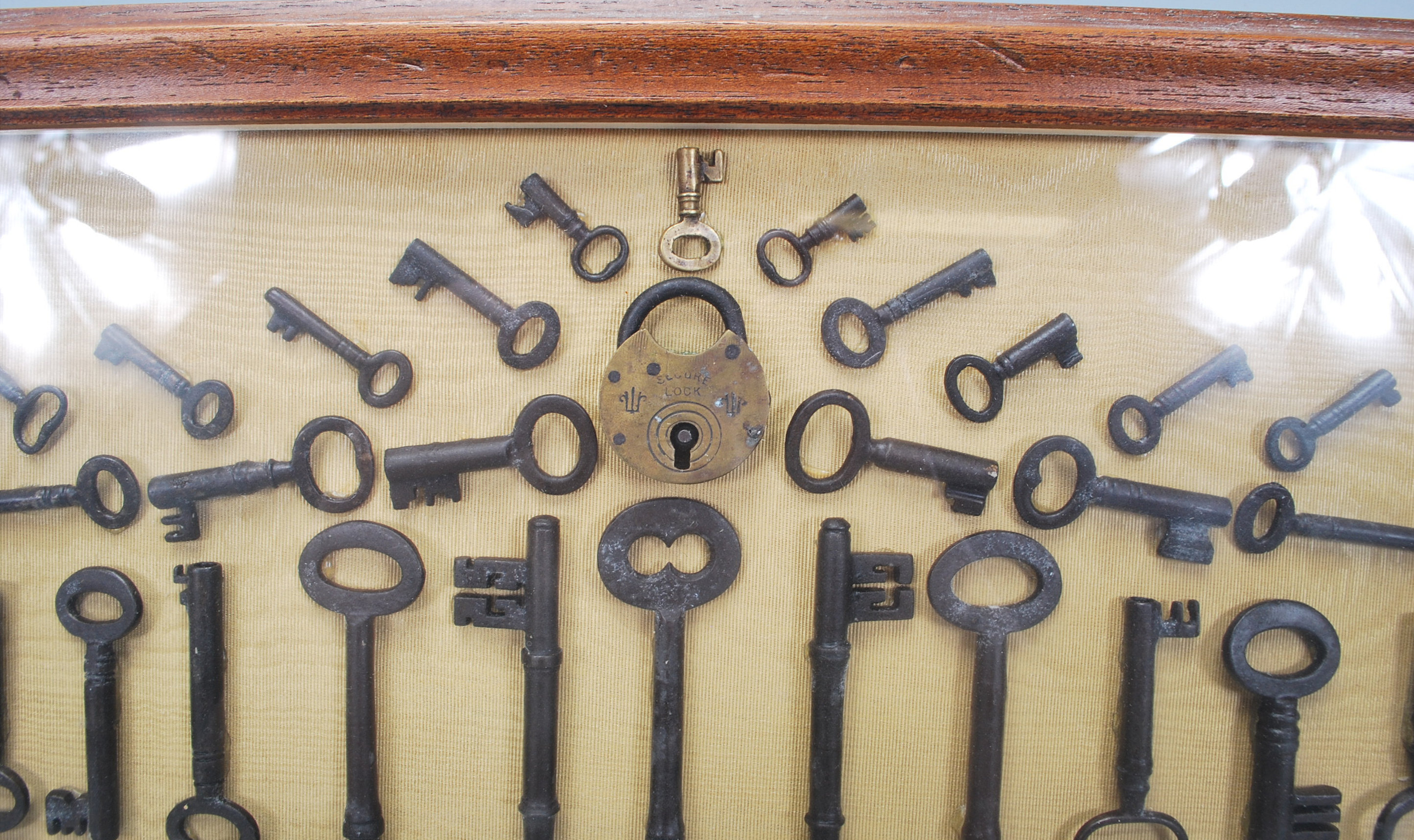 A selection of 19th Century antique keys and locks arranged into a geometric pattern and framed, set - Image 6 of 7