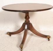 A good quality Regency revival mahogany occasional table. Raised on tripod base with reeded