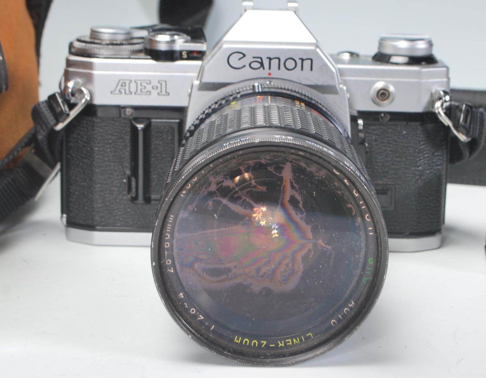 A vintage Canon AE-1 film camera having a ozunon GMC liner zoom 28-80mm lens, a Miranda 75-300mm - Bild 2 aus 9